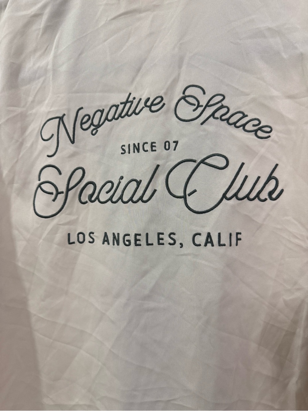 Negative Space Social Club Script Button-Up Tee in Light Pink & Black